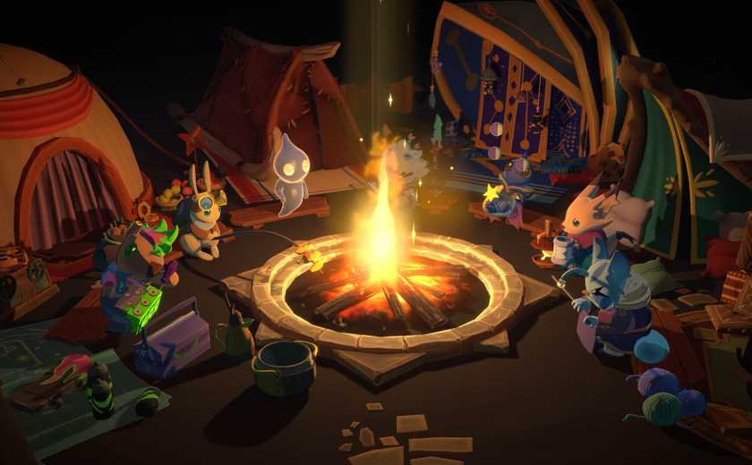 The cast of The Lonesome Guild sitting around a campfire.