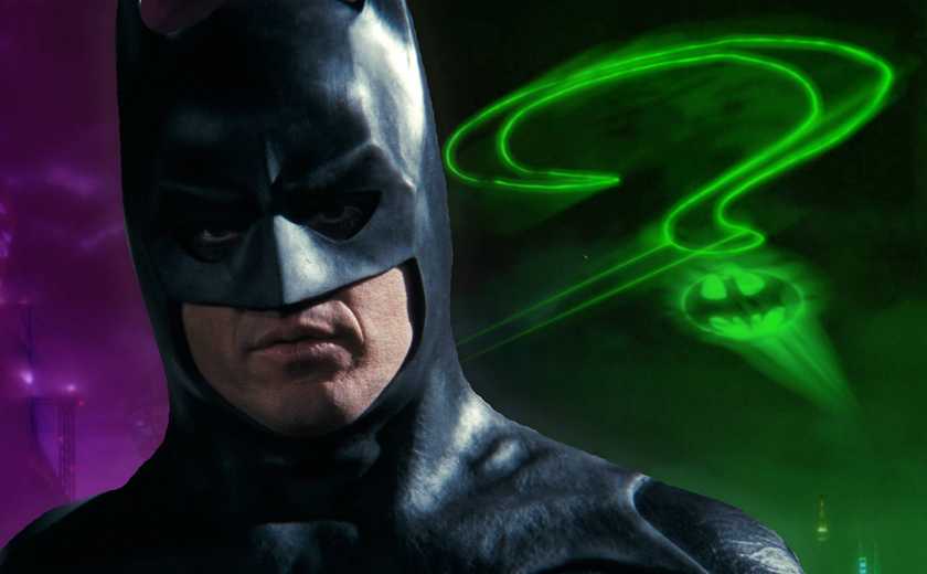Batman 1989 standing in front of Riddler symbol from Batman Forever